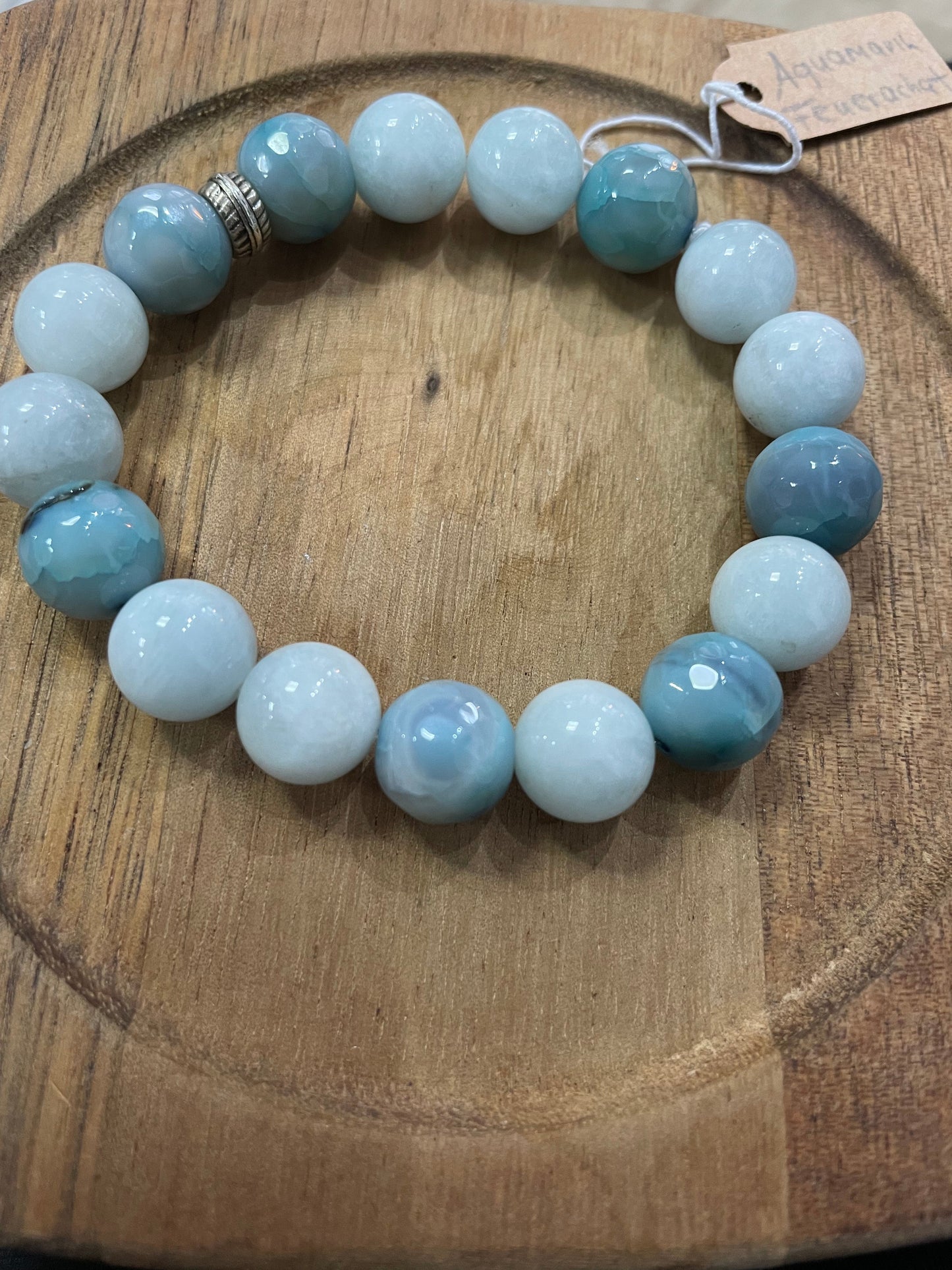 Edelstein Aquamarin und facettierter Feuerachat