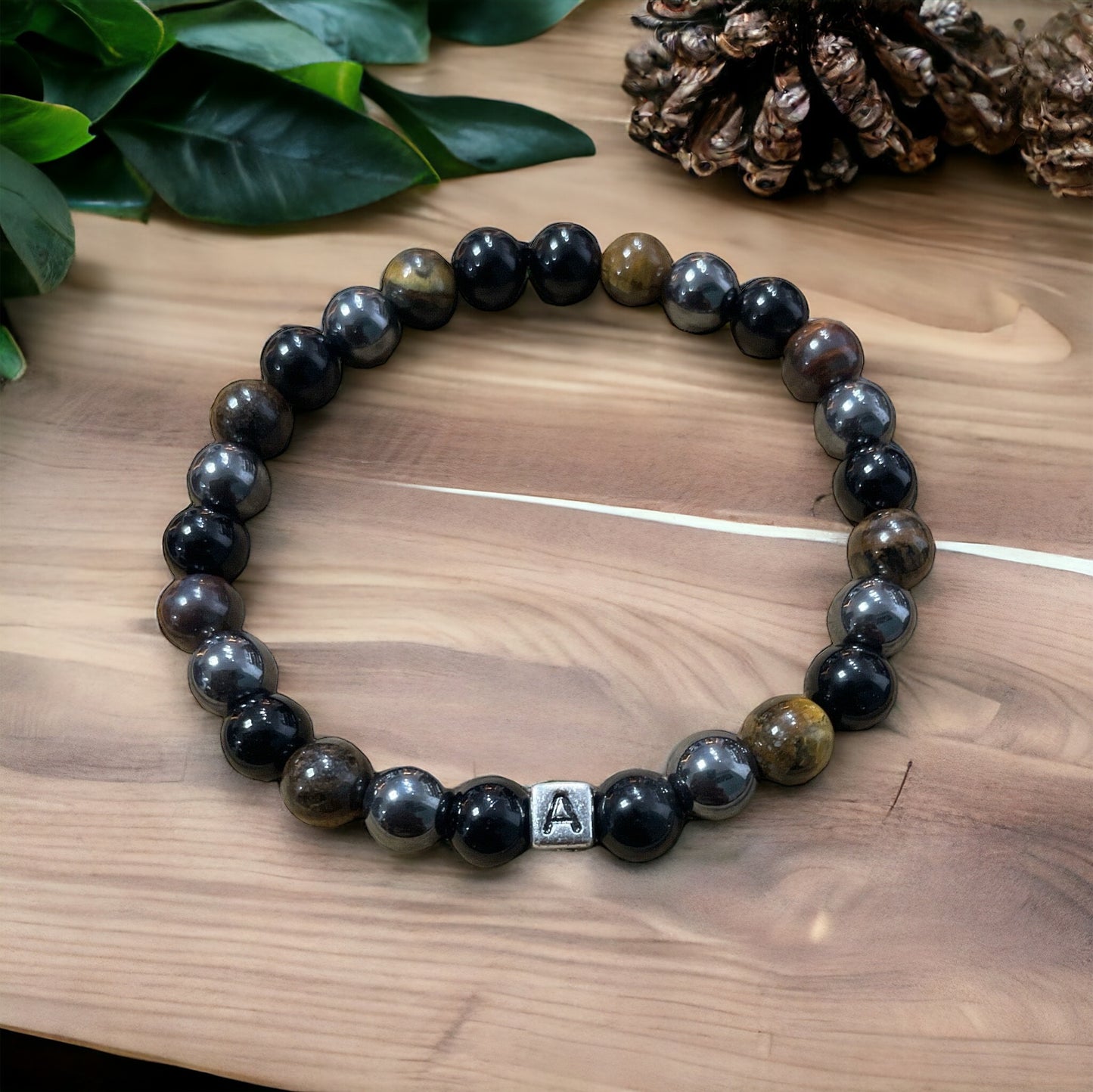 Edelstein Obsidian, Tigerauge, Hämatit mit Wunschbuchstabe