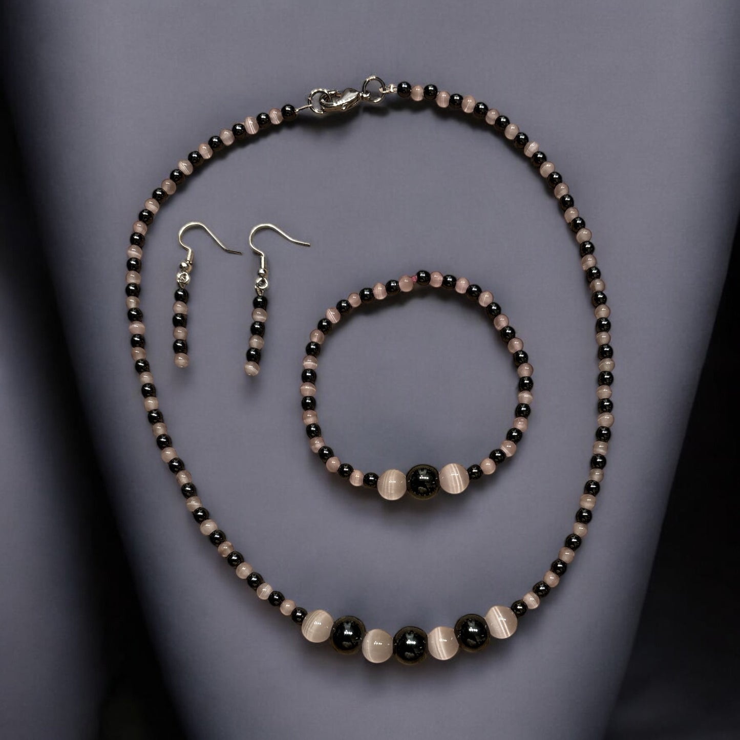 Edelstein Katzenauge rosa und Hämatit Set