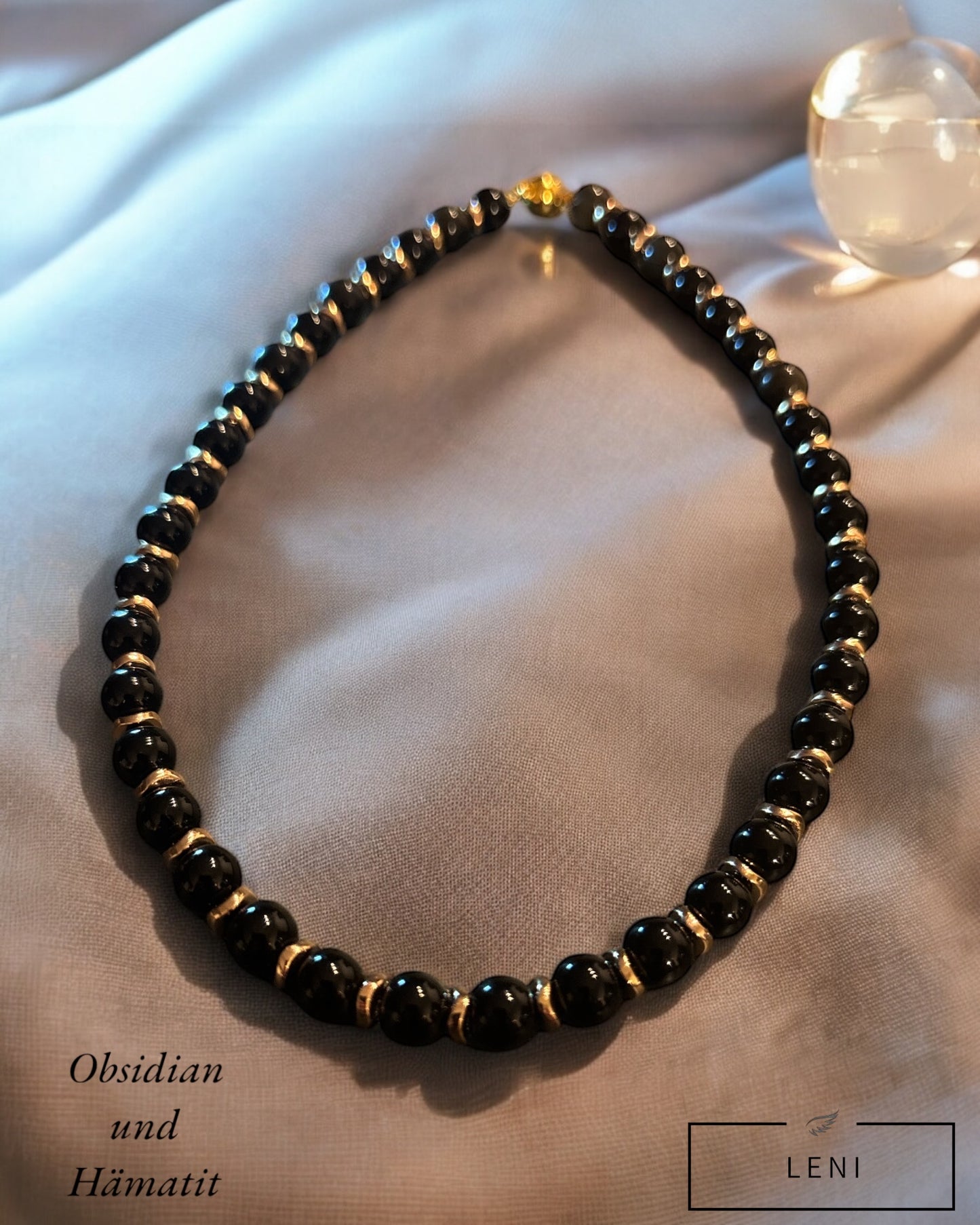 Edelstein Obsidian Kette mit goldfarbenen Hämatit Rondellen