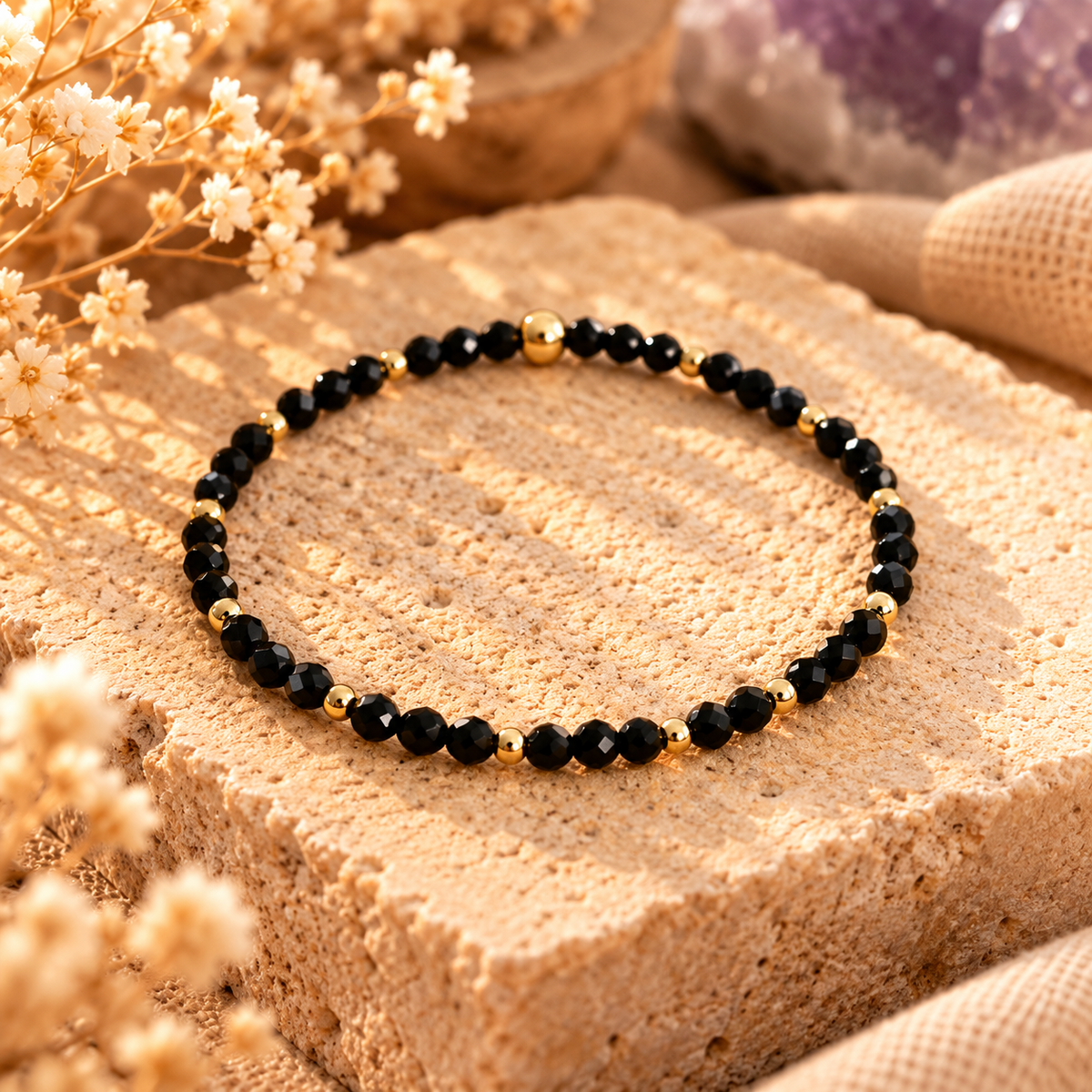Armband Obsidian facettiert mit goldfarbenem Hämatit