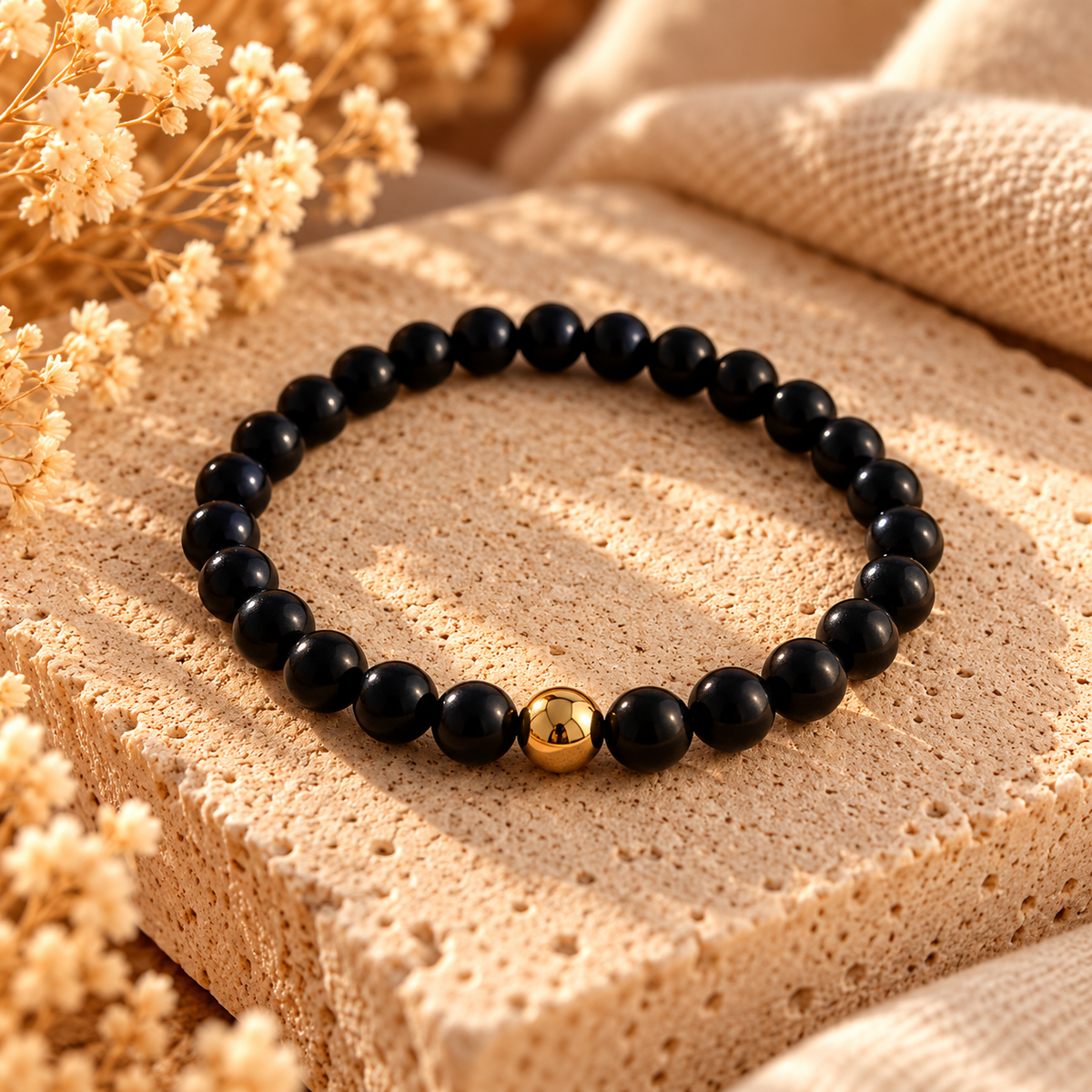 Armband Obsidian matt, mit goldfarbener Hämatitkugel